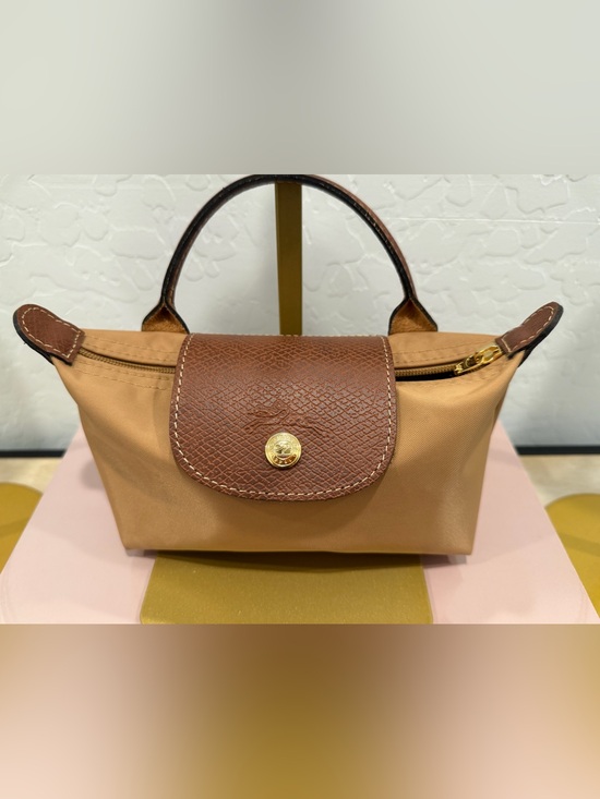 Longchamp Handbags - Longchamp Le Pliage Pouch with Top Handle